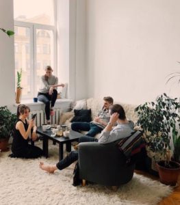 People relaxing and working together People relaxing and working together